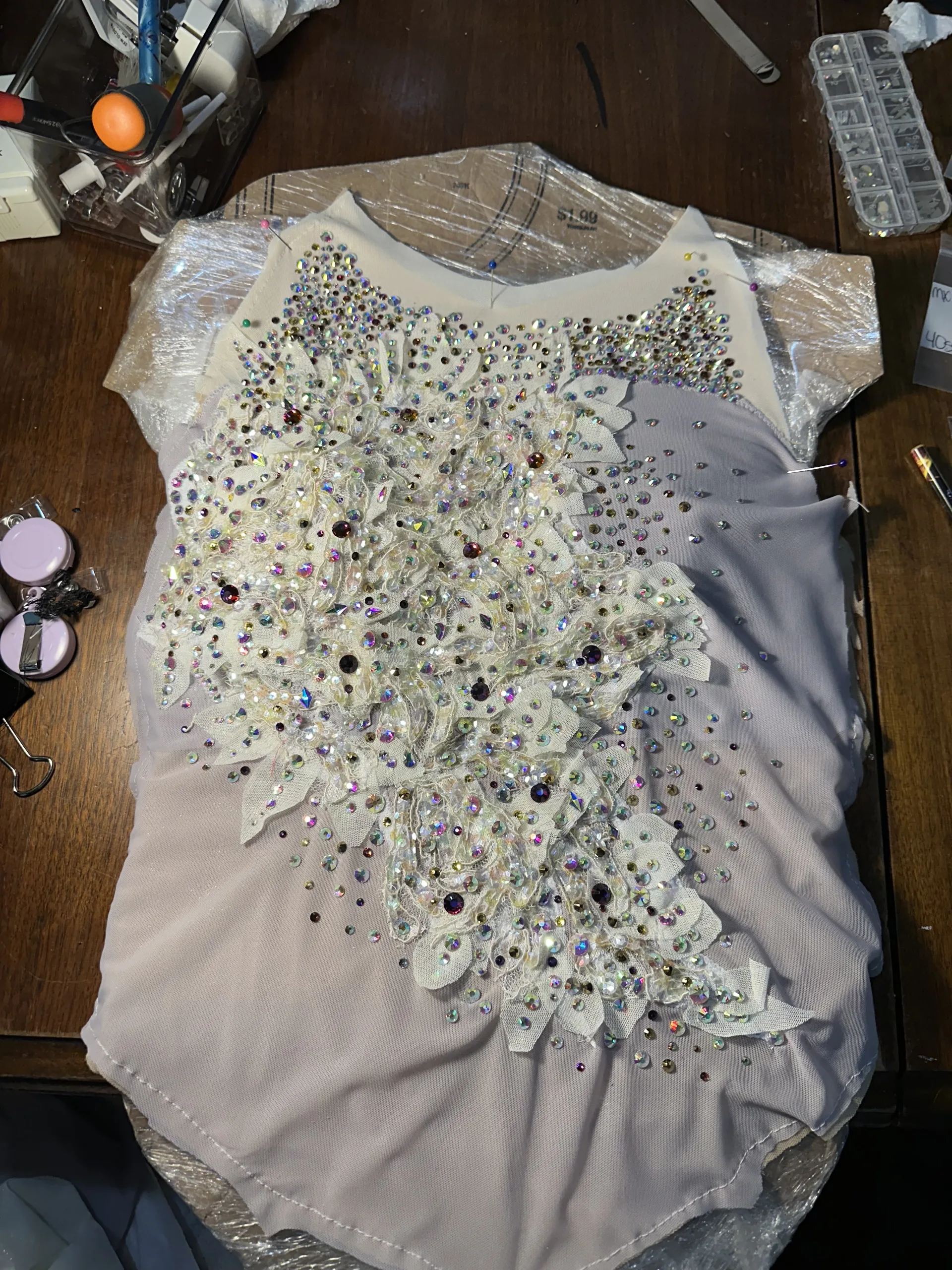 costume of purle and ivory the placing of rhinesotnes