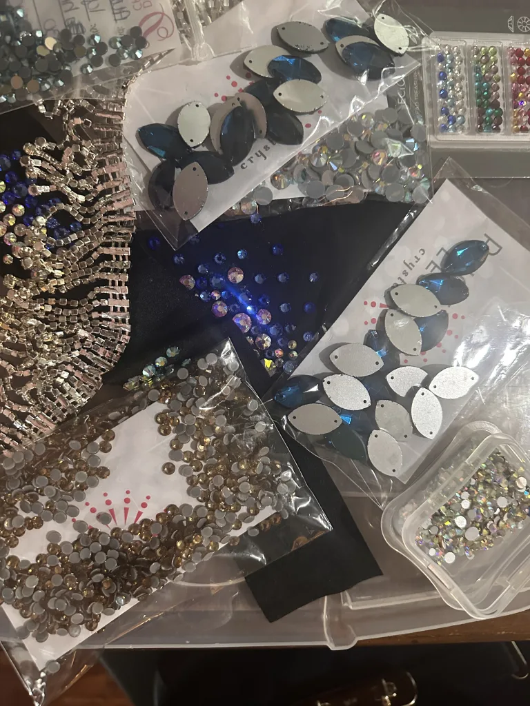 Adding sparkle to dancewear and cheer uniforms variations of embellishments