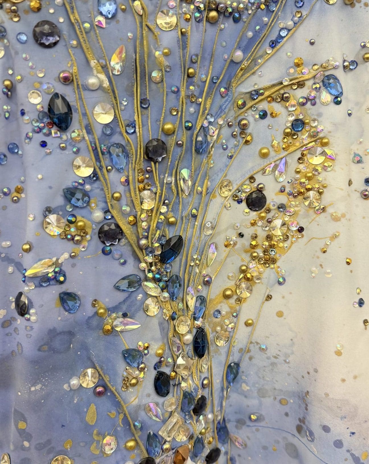 sparkle and shine of rhinestrones added to costume
