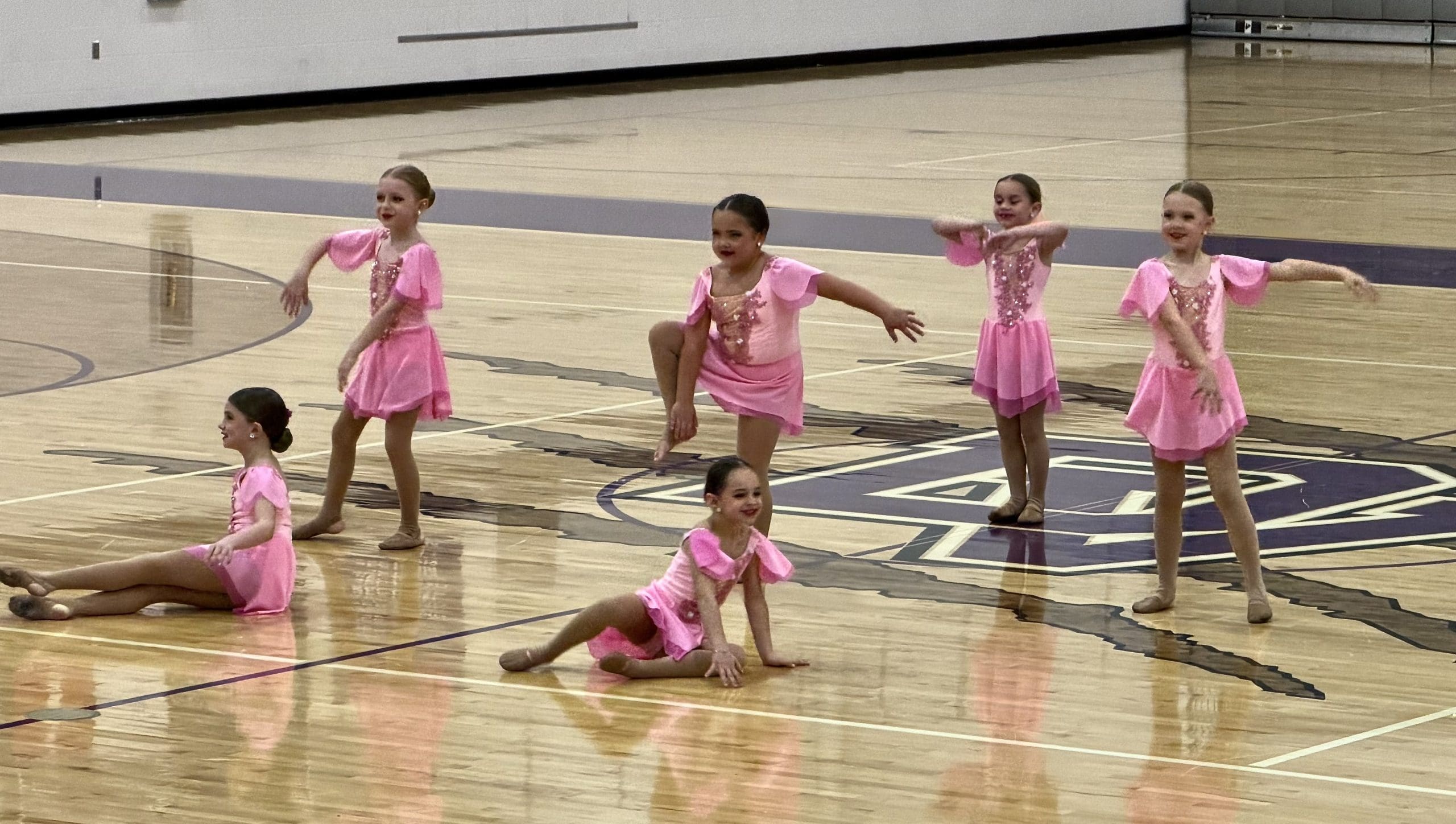 Competitive Dance Tiny Team in lyrical pink custom costum performing for audience from 5678! dance Studio mccook lake, SD by Sewn 2 Dance