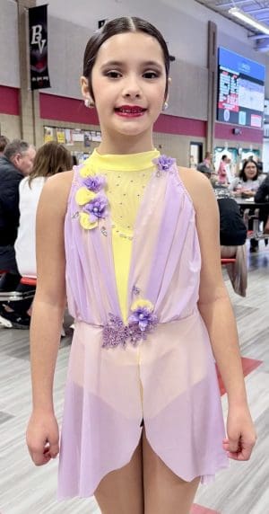 5678! Dance Studion Mini Team Member Melanie prior to going on for Competition at Brandon, SD, in Purple and Yellow Custom Team Costume