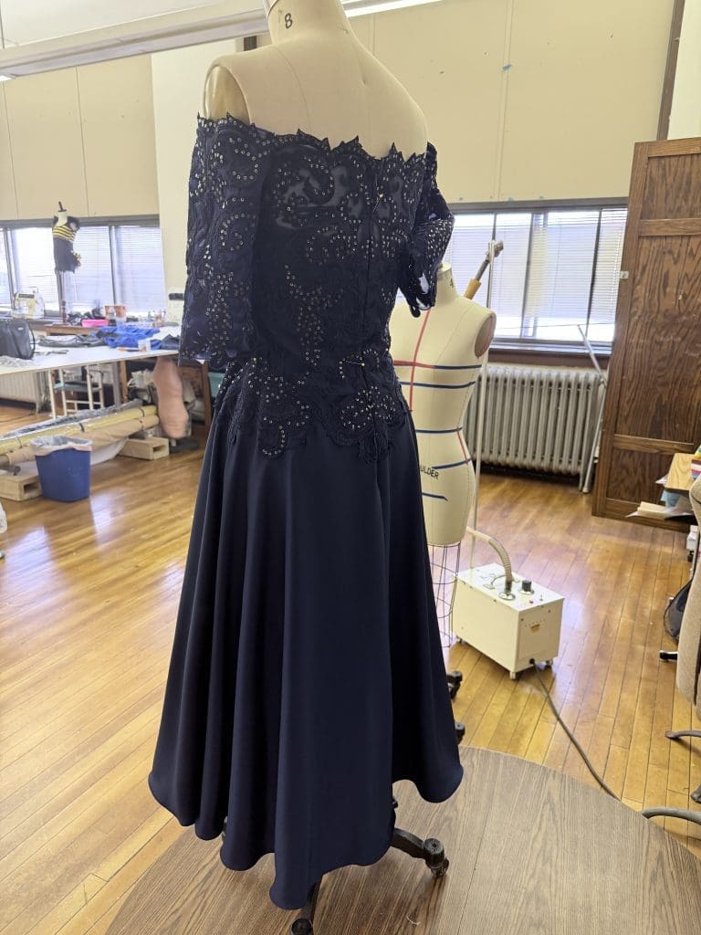 next step of recommendation of consultation fitting costume on mannequin white ballet costume fitting of straps alteration of costume blue dress on mannequin for hemming alteration