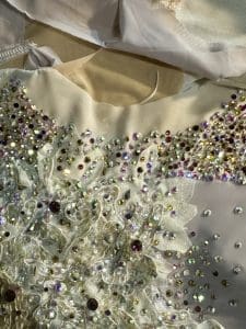 Sewn 2 Dance Custom Competitive Solo Lyrical Transformation Costume in purple and ivory before transformation of skirt Custom dance costume design consultation by Sewn 2 Dance this is an orginal custom design. hand embelliished and hand painted and airbrushed for this dramatic solo costumeCustom solo dance costume designed for lyrical performance Sewn to Dance danceaear custom adding sparkle